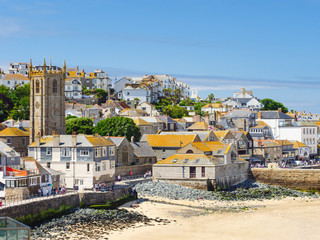 St La's Church set amongst St Ives town and beach in Cornwall, England.