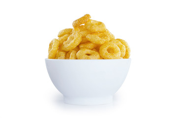 Corn rings snacks in a bowl isolated on a white background