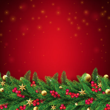 Christmas red background with fir branches and ornaments such as stars,balls and red berries.Top dropping fairy flare