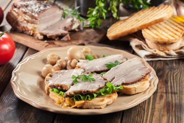 Sandwich with baked pork belly
