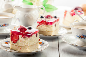 Cheesecake with strawberries, blueberry and jelly