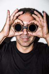 Man in steampunk glasseses on white background