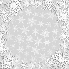 Christmas illustration with circle frame of white snowflakes on gray background