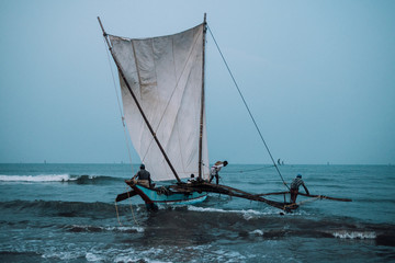 Fototapeta premium Fishermen at dawn in Asia
