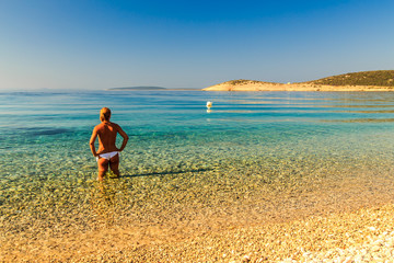Obraz premium Girl at the sea in Croatia