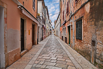 Fototapeta na wymiar Porec, Istria, Croatia: ancient alley in the old town