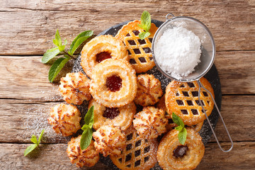 set of cookies rocher coco, couque and marimbas close-up. horizontal top view