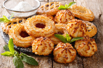 French dessert biscuit cookies rocher coco, couque and marimbas with mint closeup. horizontal