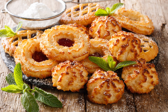 French dessert biscuit cookies rocher coco, couque and marimbas with mint closeup. horizontal