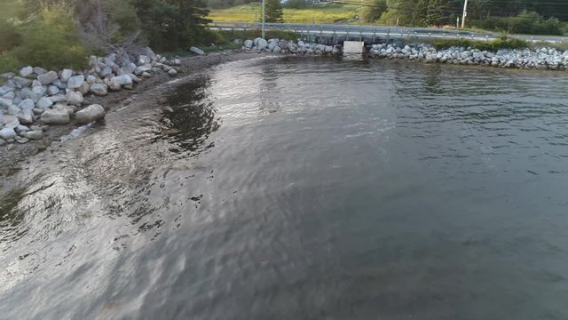 Neighbor for a boat ride to jump the waves as the ocean tide comes in.