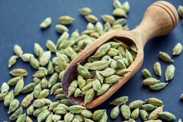 Super food cardamom health food selection in spoon.