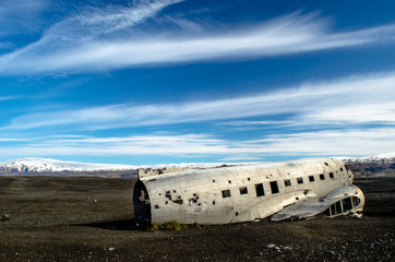 Plane wreck in Iceland. The rests of the plane are lying on the black sand in Iceland.