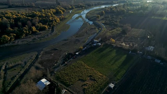 60 fps drone footage of Requegua's river in close to San Vicente Tagua tagua one of the majors agro areas of Chile