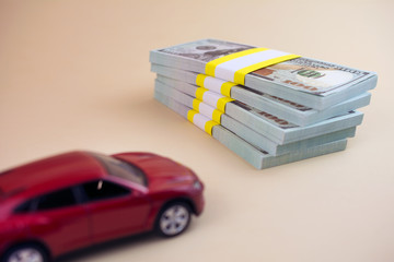  buying a new car concept. red car money