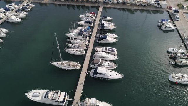Aerial view of yachts, boats and sailboats moored at a marina