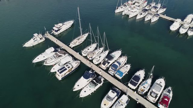 Aerial view of yachts, boats and sailboats moored at a marina