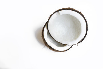 coconut broken isolated on a white background for making coconut milk , Or cosmetics for the spa.