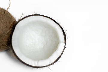 coconut broken isolated on a white background for making coconut milk , Or cosmetics for the spa.