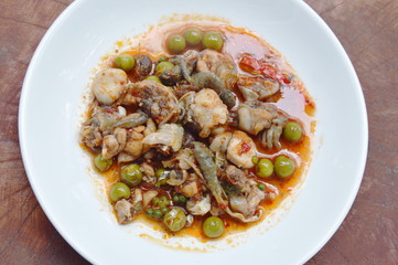 spicy stir fried frog meat and eggplant curry on plate
