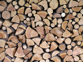 A wooden log pile