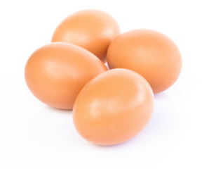 Raw chicken eggs isolated on white background