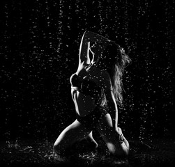 Obraz na płótnie Canvas Woman with water drops (monochrome)