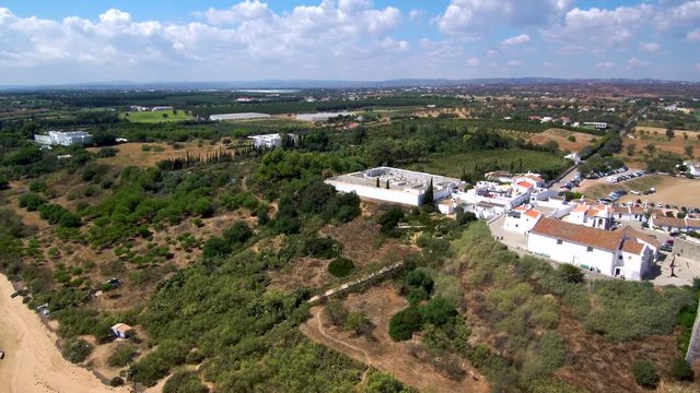 Portugal. Aerial view in Cacela Velha, coastal village in Algarve. 4k Drone Video