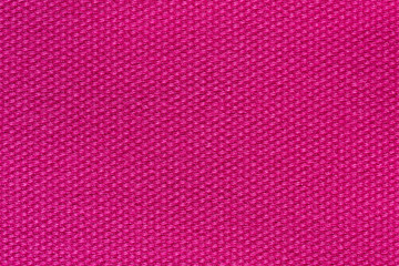 Perfective fabric background in pink colour.