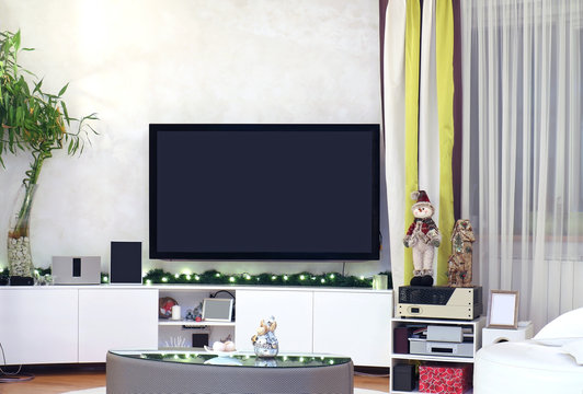 Large TV Room With Christmas Decorations