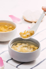 Vietnamese food, sweet lotus seed gruel, ingredients: lotus bean, sugar candy. this Vietnam dish for dessert or snack, very delicious, tasty, nutrition, make sleep well