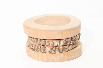 Closeup of Arrangemwnt round teak wood on white background