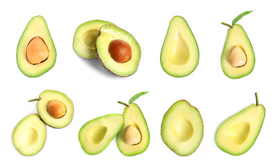 Set with ripe sliced avocados on white background