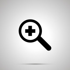 Magnifying glass with plus symbol, zoom-in simple black icon with shadow on gray