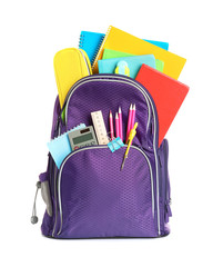 Color backpack with stationery on white background. Ready for school