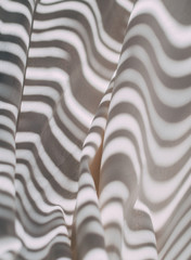 Shadow pattern lines on white wavy cloth, fabric