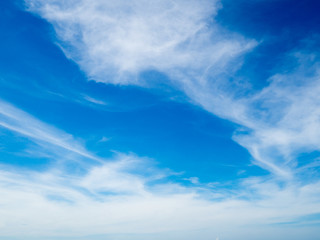 Beautiful unique perspective blue sky with tiny white cloud for background.