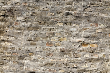 Background or texture of old vintage dirty grunge brick wall with peeling plaster and concrete