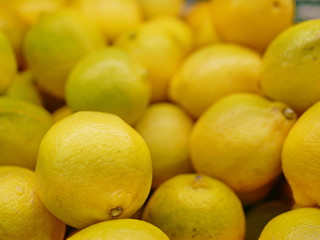Close up and selective focus background of yellow limes