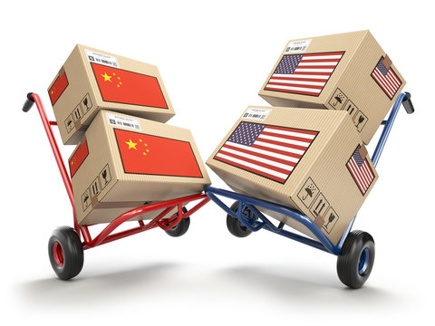 USA China economic trade war market conflict concept.  Two opposing hand trucks and cardboard boxes with USA and China flags.,