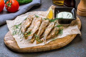 fried surmullet on board