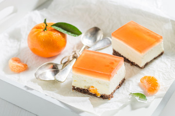 Sweet cheesecake made of fresh mandarin and jelly