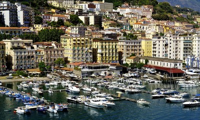 Fototapeta na wymiar Apartments and the harbour of Salerno