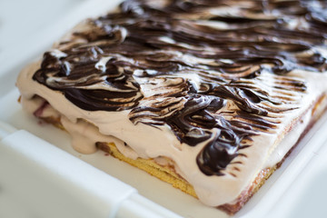 Sponge cake with sour cream and chocolate