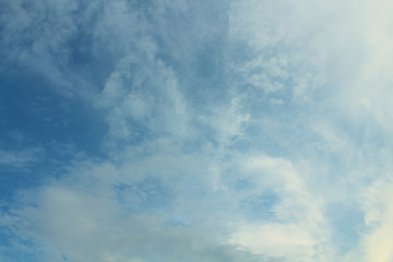 Blue sky and beautiful white cirrus clouds. Background. Landscape.