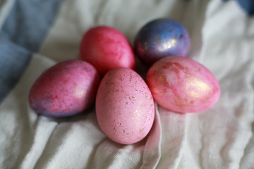 Colorful pastel Easter eggs with gold