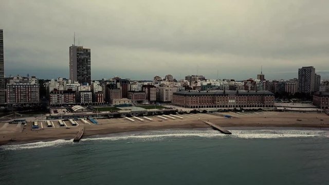 Sky view of Mar del Plata Argentina – 4k drone video of the Argentinian coast and downtown area of Mar del Plata Casino Central in spring time.  Buenos Aires Capital Federal district  
