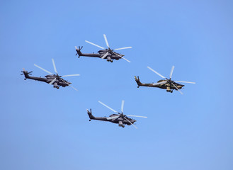 Combat helicopters in flight