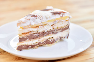 Cake on a plate. Sweet dish. A piece of baking.