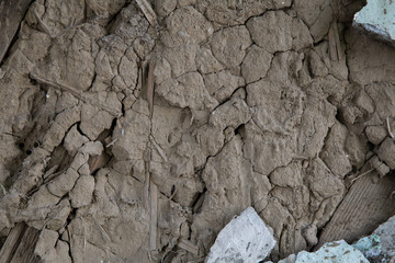  The texture of a cracked clay wall