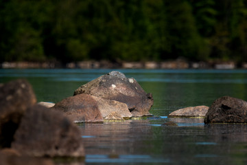 Fototapeta na wymiar Rocks by the shore of lake Vättern in Sweden